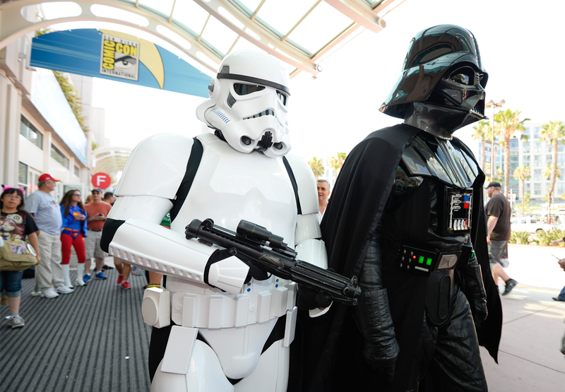 Darth Vader and his personal escort. Image Credit: Denis Poroy/Invision/AP
